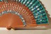 Handfächer Gracia in der Farbe Grün im Angebot bei Hitzewelle dem Online Fächerstore