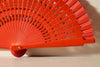 Handfächer Mara in der Farbe Rot im Angebot bei Hitzewelle dem Online Fächerstore