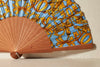 Handfächer Goldy in der Farbe Blau im Angebot bei Hitzewelle dem Online Fächerstore