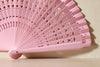 Handfächer Mila in der Farbe Rosa im Angebot bei Hitzewelle dem Online Fächerstore